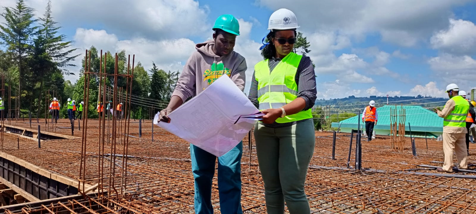 Electrical Engineer  Victoria Mutunga giving instructions on site