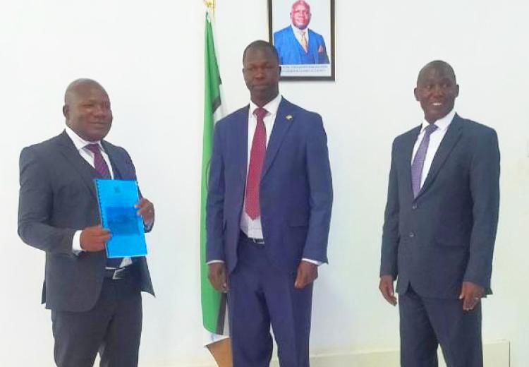 Principal Secretary(accompanied by the Secretary NBI) handing over Audit report to the Governor of Kakamega County 